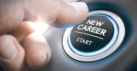 Finger pressing a new career start button. Concept of occupational or profession