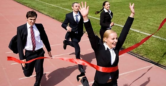 Photo of businesspeople crossing the finish line